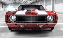 Obraz Wieloczęściowy Czerwony Muscle Car W Garażu