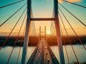 Fototapeta Beautiful Panoramic Aerial Drone View To Cable-Stayed Siekierkowski Bridge Over The Vistula River And Warsaw City Sky