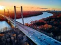 Fototapeta Beautiful Panoramic Aerial Drone View To Cable-Stayed Siekierkowski Bridge Over The Vistula River And Warsaw City Sky