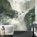 Fototapeta A Flowing Waterfall In Norway