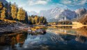 Fototapeta Awesome Sunny Landscape In The Forest. Wonderful Autumn Scenery. Picturesque View Of Nature Wild Lake. Sun Rays Throu