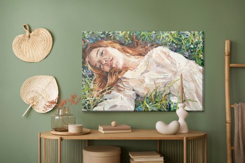 Obraz Na Płótnie .A Red-Haired Beauty, A Young Girl Lies And Dreams On The Field Among Various Summer Grasses And Wildflowers. O