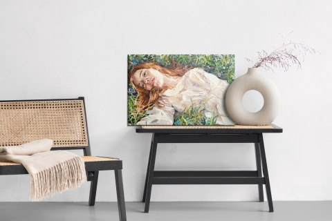 Obraz Na Płótnie .A Red-Haired Beauty, A Young Girl Lies And Dreams On The Field Among Various Summer Grasses And Wildflowers. O