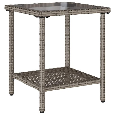 Sofa ogrodowa ze stołem i poduszkami w kształcie litery L