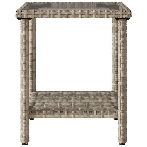 Sofa ogrodowa ze stołem i poduszkami w kształcie litery L